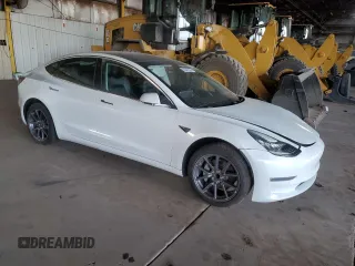 2019 Tesla Model 3 Mid Range with VIN 5YJ3E1EA3KF425125, listed as a Copart auction lot 82681864 with 105,345 mi miles and Salvage Title. Bid and sale history available at DreamBid. Image 4.