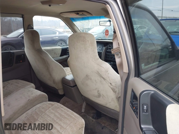 1995 Jeep Grand Cherokee Laredo with VIN 1J4GZ58S4SC555309, listed as a IAAI auction lot 41600141 with 130,493 mi miles. Bid and sale history available at carsss.com. Image 8.