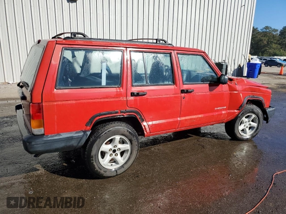 1999 Jeep Cherokee SE with VIN 1J4FT28S6XL515896, listed as a Copart auction lot 83745444 with 192,406 mi miles and Salvage title. Bid and sale history available at DreamBid. Image 3.