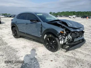 2024 Mazda CX-30 S Carbon Edition с VIN 3MVDMBCMXRM604194, выставлен на аукционе Copart как лот 54777125 с пробегом 9 816 миль миль и Списание • Salvage title. История ставок и продаж доступна на DreamBid. Изображение 14.