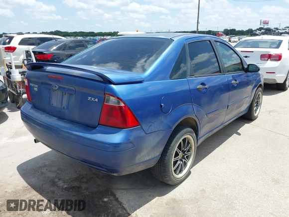 2005 Ford Focus S with VIN 1FAFP34N65W158687, listed as a IAAI auction lot 42706418 with Not provided miles and . Bid and sale history available at DreamBid. Image 4.