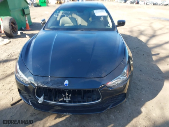 2014 Maserati Ghibli S Q4 with VIN ZAM57RTA1E1091738, listed as a IAAI auction lot 41518359 with 75,641 mi miles. Bid and sale history available at carsss.com. Image 6.