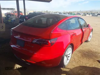 2023 Tesla Model 3 with VIN 5YJ3E1EA9PF546264, listed as a IAAI auction lot 41657055 with 5,634 mi miles and . Bid and sale history available at DreamBid. Image 4.