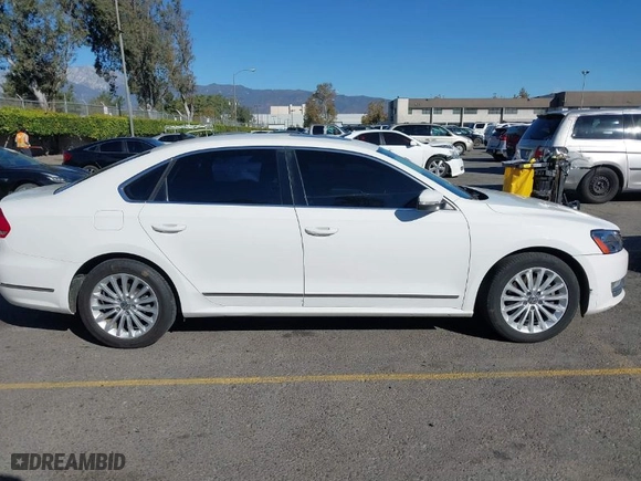 2015 Volkswagen Passat 1.8T SE w/Sunroof & Nav with VIN 1VWBT7A3XFC075648, listed as a IAAI auction lot 40808040 with 189,620 mi miles. Bid and sale history available at carsss.com. Image 13.