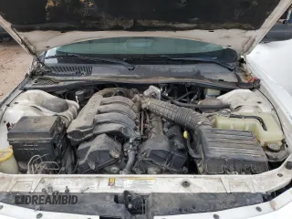 2009 Dodge Charger SE z VIN 2B3KA43D09H629621, wystawiony jako Copart lot #55808625 z przebiegiem 165 375 mil mil oraz Szkoda całkowita • Salvage title. Historia ofert i sprzedaży dostępna na DreamBid. Obrazek 11.