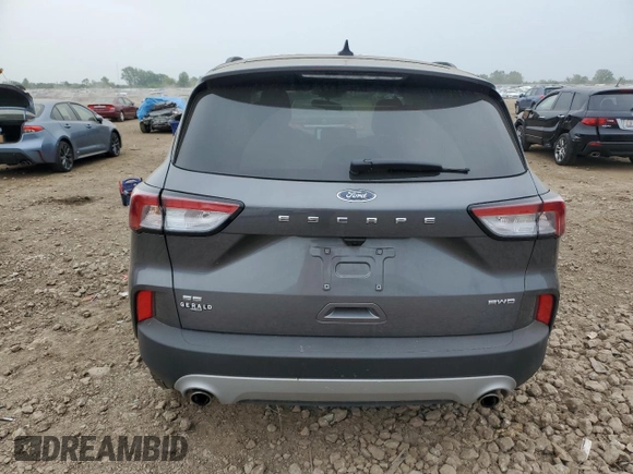 2021 Ford Escape SE with VIN 1FMCU9G64MUB16148, listed as a Copart auction lot 60994595 with 7,772 mi miles and Salvage title. Bid and sale history available at DreamBid. Image 6.