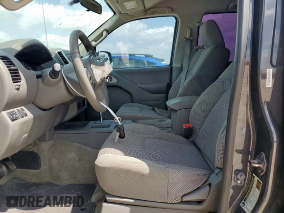 2015 Nissan Frontier SV with VIN 1N6AD0ER7FN728259, listed as a Copart auction lot 65002615 with 133,174 mi miles and Salvage title. Bid and sale history available at DreamBid. Image 7.