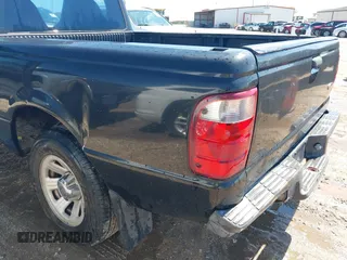 2003 Ford Ranger XL with VIN 1FTYR10D13PB63124, listed as a IAAI auction lot 41876969 with 164,574 mi miles. Bid and sale history available at carsss.com. Image 6.
