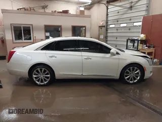 2013 Cadillac XTS Luxury with VIN 2G61R5S37D9152726, listed as a IAAI auction lot 41718331 with 88,189 mi miles and . Bid and sale history available at DreamBid. Image 12.