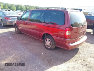 2002 Chevrolet Venture Warner Bros 1SE z VIN 1GNDX13E92D136351, wystawiony jako IAAI lot #42230619 z przebiegiem 309 705 mil mil oraz . Historia ofert i sprzedaży dostępna na DreamBid. Obrazek 3.