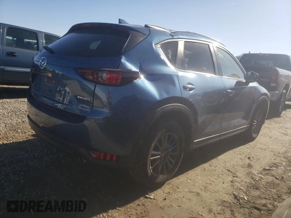 2020 Mazda CX-5 Touring with VIN JM3KFACM8L0774374, listed as a Copart auction lot 42870895 with 71,925 mi miles and Salvage Title. Bid and sale history available at DreamBid. Image 3.