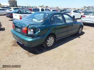1999 Honda Civic VP with VIN 2HGEJ6611XH540017, listed as a IAAI auction lot 42093222 with 154,261 mi miles. Bid and sale history available at carsss.com. Image 4.