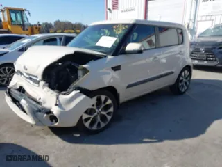 2013 Kia Soul + with VIN KNDJT2A6XD7760122, listed as a IAAI auction lot 41652106 with 116,237 mi miles. Bid and sale history available at carsss.com. Image 2.