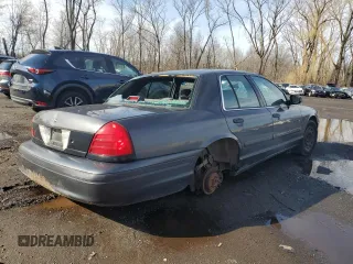 2004 Ford Police Interceptor Base w/3.27 Axle with VIN 2FAFP71W54X126756, listed as a Copart auction lot 50311705 with 135,654 mi miles and Salvage title. Bid and sale history available at DreamBid. Image 3.