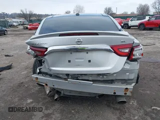 2016 Nissan Maxima SV with VIN 1N4AA6AP6GC416407, listed as a IAAI auction lot 41227003 with 125,781 mi miles and . Bid and sale history available at DreamBid. Image 16.