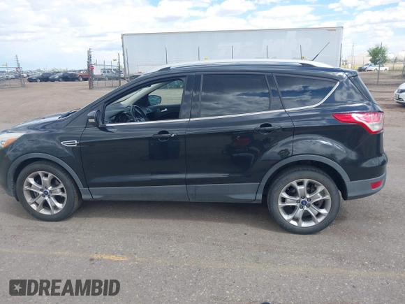 2014 Ford Escape Titanium with VIN 1FMCU9JX2EUB66579, listed as a IAAI auction lot 42171374 with 131,485 mi miles. Bid and sale history available at carsss.com. Image 14.