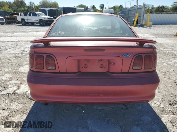 1997 Ford Mustang with VIN 1FALP4043VF109078, listed as a Copart auction lot 74601704 with 133,838 mi miles and Salvage Title. Bid and sale history available at carsss.com. Image 6.
