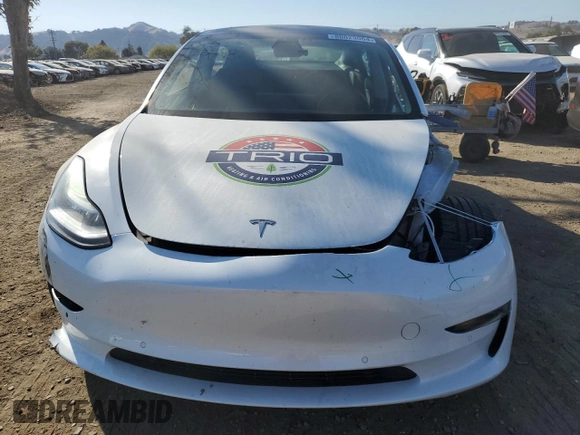 2019 Tesla Model 3 Mid Range with VIN 5YJ3E1EA4KF401500, listed as a Copart auction lot 80029064 with 100,077 mi miles and Salvage Title. Bid and sale history available at carsss.com. Image 5.