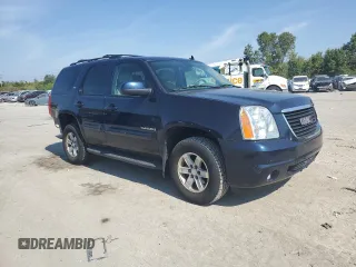2007 GMC Yukon SLT with VIN 1GKFK13057J345796, listed as a Copart auction lot 71773124 with 218,788 mi miles and Salvage Title. Bid and sale history available at carsss.com. Image 4.
