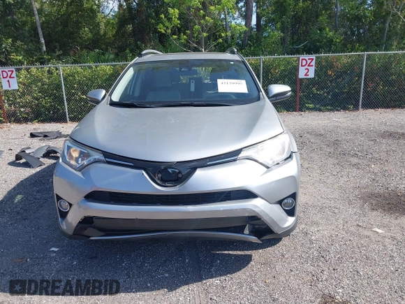 2018 Toyota RAV4 XLE with VIN JTMWFREV9JJ203353, listed as a IAAI auction lot 42129995 with 41,806 mi miles and . Bid and sale history available at DreamBid. Image 13.