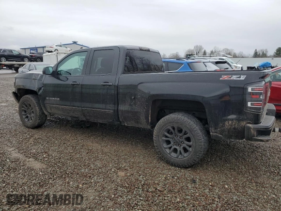 2017 Chevrolet Silverado 1500 LT with VIN 1GCVKREC1HZ315310, listed as a Copart auction lot 52013545 with 134,883 mi miles and Salvage Title. Bid and sale history available at DreamBid. Image 2.