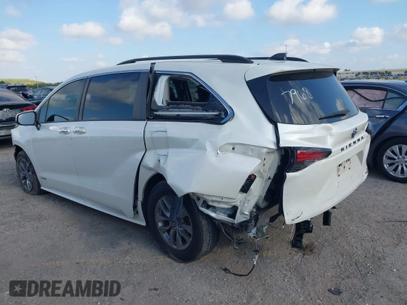 2021 Toyota Sienna XLE with VIN 5TDYRKEC7MS017968, listed as a IAAI auction lot 42145440 with 85,989 mi miles and . Bid and sale history available at DreamBid. Image 3.