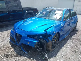 2021 Alfa Romeo Giulia Quadrifoglio with VIN ZARFAMEV1M7648209, listed as a IAAI auction lot 42241740 with 48,850 mi miles and . Bid and sale history available at DreamBid. Image 2.