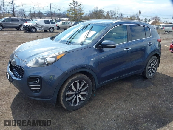 2018 Kia Sportage EX with VIN KNDPNCAC6J7385888, listed as a IAAI auction lot 41875250 with 139,022 mi miles and . Bid and sale history available at carsss.com. Image 2.