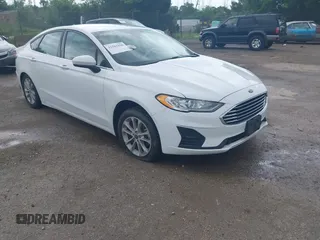 2020 Ford Fusion SE z VIN 3FA6P0HD4LR260019, wystawiony jako IAAI lot #42581828 z przebiegiem 56 408 mil mil oraz . Historia ofert i sprzedaży dostępna na DreamBid. Obrazek 1.
