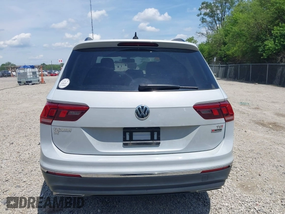 2018 Volkswagen Tiguan SEL z VIN 3VV2B7AX6JM195125, wystawiony jako IAAI lot #42523047 z przebiegiem 73 926 mil mil oraz . Historia ofert i sprzedaży dostępna na DreamBid. Obrazek 17.