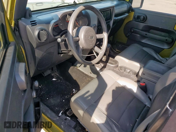 2008 Jeep Wrangler X with VIN 1J4FA24148L617265, listed as a Copart auction lot 53054495 with 143,270 mi miles and Salvage Title. Bid and sale history available at DreamBid. Image 8.