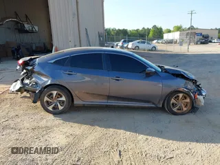 2020 Honda Civic LX with VIN 2HGFC2F67LH534381, listed as a IAAI auction lot 42056676 with 124,344 mi miles and . Bid and sale history available at DreamBid. Image 14.