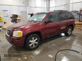 2003 GMC Envoy SLT with VIN 1GKDT13S532241707, listed as a Copart auction lot 86694024 with 185,480 mi miles and Clean Title. Bid and sale history available at carsss.com. Image 1.