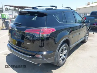 2018 Toyota RAV4 XLE with VIN 2T3WFREV2JW447623, listed as a IAAI auction lot 42410168 with 84,800 mi miles and . Bid and sale history available at DreamBid. Image 4.