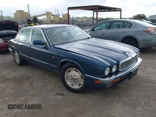 1996 Jaguar XJ with VIN SAJHX1743TC759842, listed as a IAAI auction lot 41778155 with 189,315 mi miles and . Bid and sale history available at DreamBid. Image 1.
