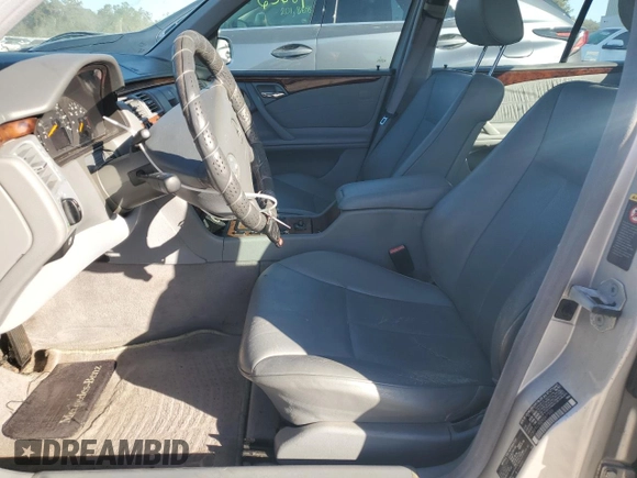 2002 Mercedes-Benz E-Class with VIN WDBJF82J92X067535, listed as a Copart auction lot 82759874 with 193,765 mi miles and Salvage Title. Bid and sale history available at carsss.com. Image 7.