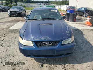 1999 Ford Mustang с VIN 1FAFP4049XF207029, выставлен на аукционе Copart как лот 60026465 с пробегом 158 209 миль миль и Списание • Salvage title. История ставок и продаж доступна на DreamBid. Изображение 5.