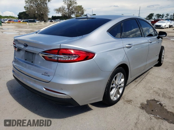 2019 Ford Fusion SE with VIN 3FA6P0LU8KR242998, listed as a Copart auction lot 48927543 with 102,036 mi miles and . Bid and sale history available at DreamBid. Image 4.