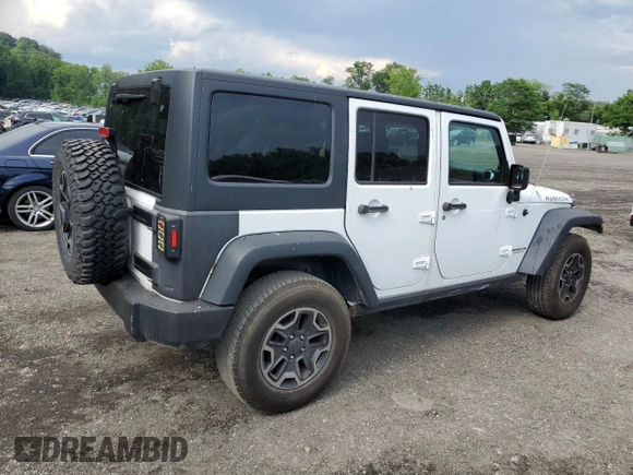 2014 Jeep Wrangler Unlimited Rubicon with VIN 1C4HJWFG4EL114743, listed as a Copart auction lot 61397575 with 110,222 mi miles and Salvage title. Bid and sale history available at DreamBid. Image 3.