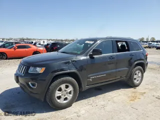 2015 Jeep Grand Cherokee Laredo with VIN 1C4RJFAG9FC905931, listed as a Copart auction lot 52259525 with 131,438 mi miles and Salvage Title. Bid and sale history available at carsss.com. Image 1.