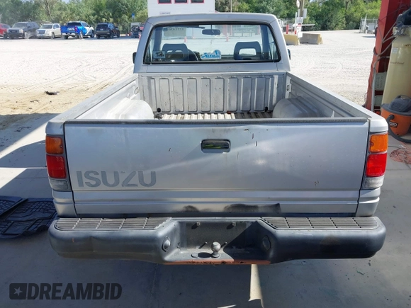 1990 Isuzu Pickup S z VIN JAACL11L6L7206171, wystawiony jako IAAI lot #42214364 z przebiegiem 75 057 mil mil oraz . Historia ofert i sprzedaży dostępna na DreamBid. Obrazek 16.