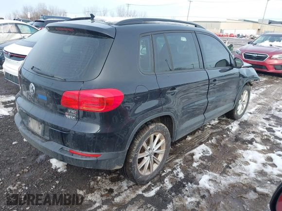 2017 Volkswagen Tiguan S with VIN WVGBV7AX7HK047973, listed as a IAAI auction lot 41197329 with 92,960 mi miles and . Bid and sale history available at DreamBid. Image 4.