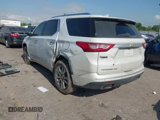 2020 Chevrolet Traverse High Country with VIN 1GNEVNKWXLJ135322, listed as a IAAI auction lot 42042466 with 105,748 mi miles and . Bid and sale history available at DreamBid. Image 3.