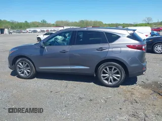 2020 Acura RDX Technology with VIN 5J8TC2H54LL019140, listed as a IAAI auction lot 42102793 with 56,519 mi miles and . Bid and sale history available at DreamBid. Image 14.