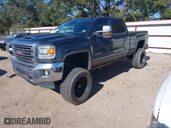 2018 GMC Sierra 2500HD SLT with VIN 1GT12TEY8JF139452, listed as a IAAI auction lot 41253932 with 202,672 mi miles. Bid and sale history available at carsss.com. Image 2.
