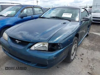 1996 Ford Mustang GT z VIN 1FALP42XXTF137304, wystawiony jako IAAI lot #42464808 z przebiegiem 166 565 mil mil oraz . Historia ofert i sprzedaży dostępna na DreamBid. Obrazek 6.