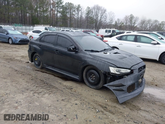 2010 Mitsubishi Lancer Evolution GSR with VIN JA32W8FV1AU012725, listed as a IAAI auction lot 41542629 with 124,347 mi miles and . Bid and sale history available at DreamBid. Image 1.