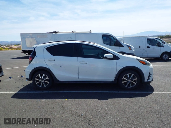2018 Toyota Prius One with VIN JTDKDTB32J1599890, listed as a IAAI auction lot 42009820 with 57,959 mi miles and . Bid and sale history available at DreamBid. Image 13.