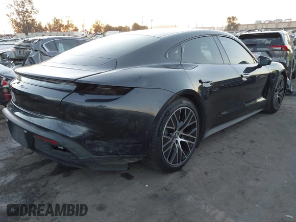 2021 Porsche Taycan with VIN WP0AA2Y15MSA18727, listed as a IAAI auction lot 41097801 with 20,933 mi miles and . Bid and sale history available at DreamBid. Image 4.