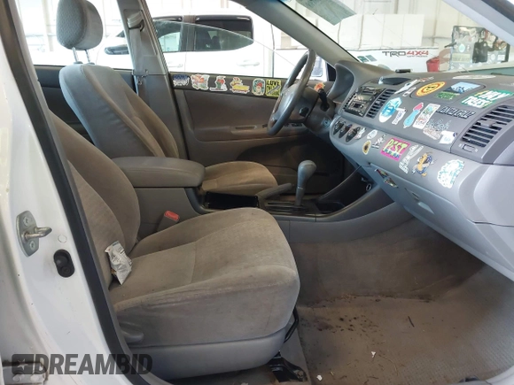 2004 Toyota Camry LE with VIN JTDBE32K540257588, listed as a IAAI auction lot 42208098 with 201,770 mi miles and . Bid and sale history available at DreamBid. Image 5.